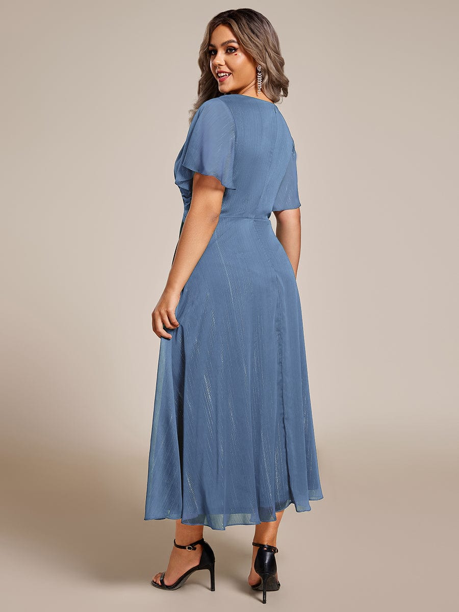 Plus Size Silver Metallic Fabric V-Neck A-Line Dress featuring Delicate Ruffled Hem #color_Dusty Blue