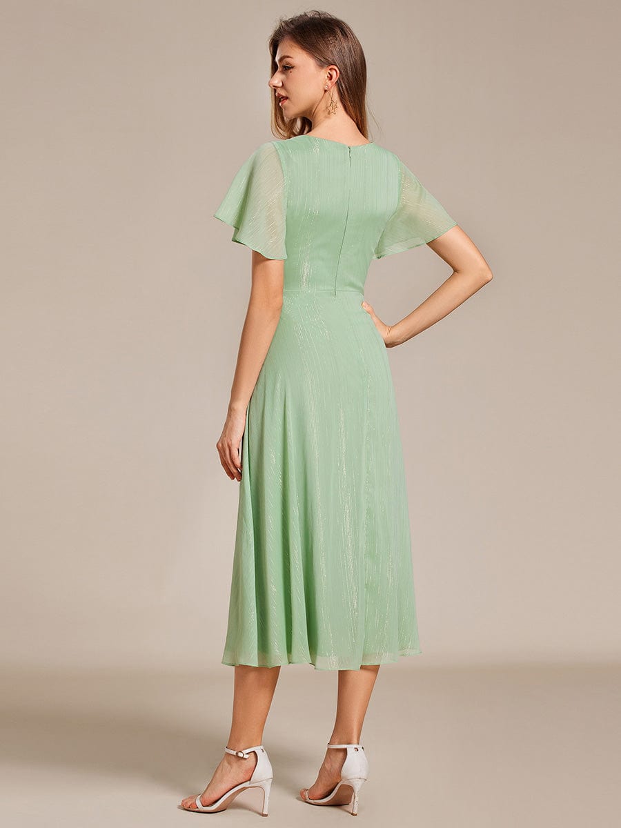 Silver Metallic Fabric V-Neck A-Line Dress featuring Delicate Ruffled Hem #color_Summer Green