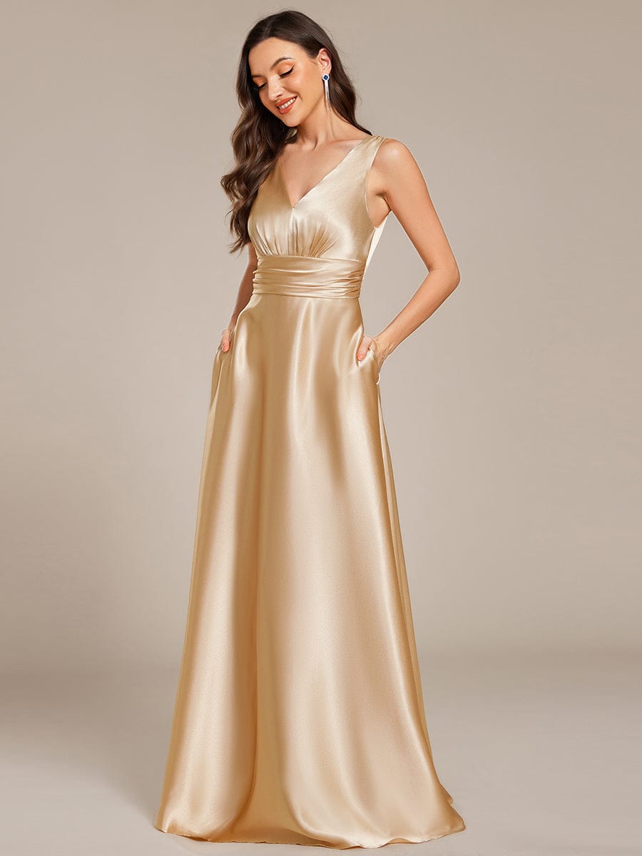 V-neck Empire Waist Satin Maxi Bridesmaid Dress with Pockets #color_Champagne